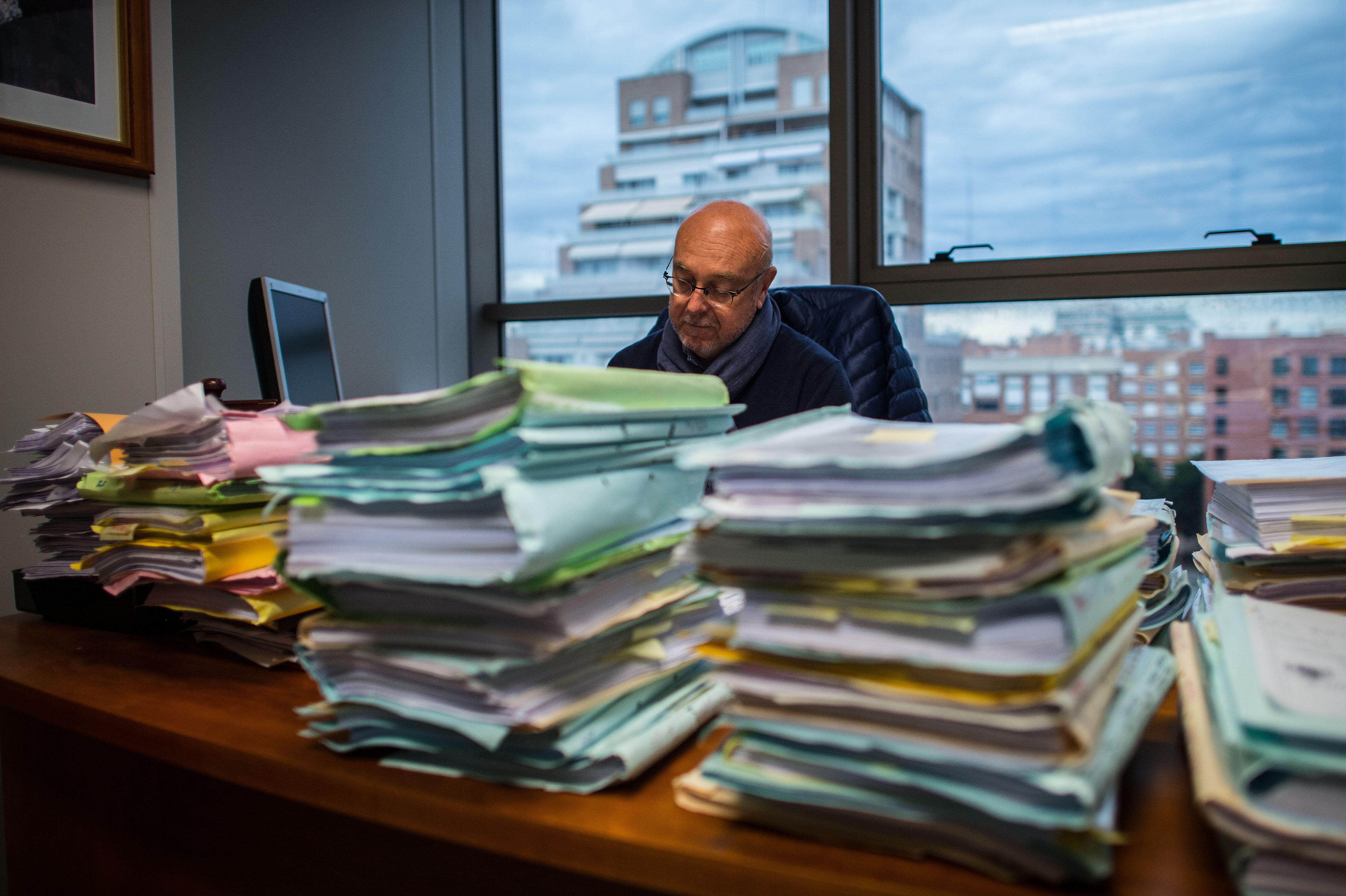 VALENCIA, SPAIN - FEBRUARY 04:  Judge of the Commercial Court number 3, Jose Maria Cutillas works in his office on February 4, 2015 in Valencia, Spain. The Commercial Court number 3 of Valencia is one of the most overloaded courts across Spain. Last year 