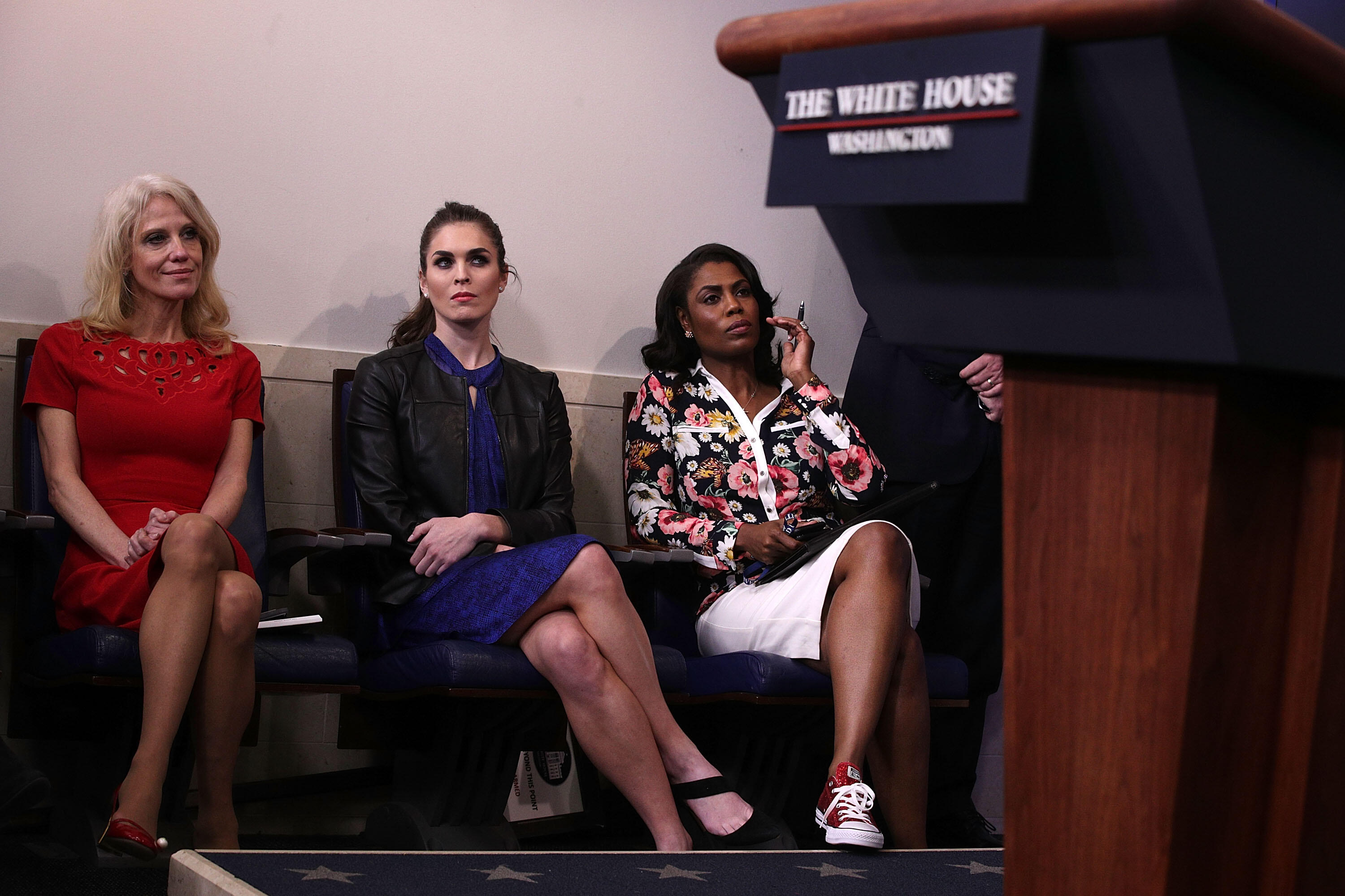 WASHINGTON, DC - FEBRUARY 14:  (L-R) White House Counselor Kellyanne Conway; Hope Hicks, White House Director of Strategic Communications; and Omarosa Manigault, Director of Communications for the Office of Public Liaison, listen during a daily press brie