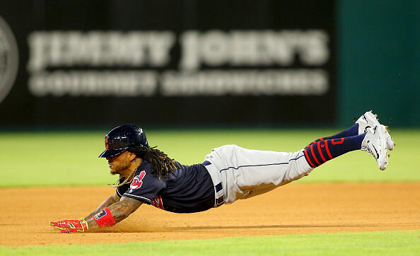 ARLINGTON, TX - APRIL 05: Michael Martinez #1 of the Cleveland Indians steals second base in the seventh inning against the Texas Rangers at Globe Life Park in Arlington on April 5, 2017 in Arlington, Texas. (Photo by Rick Yeatts/Getty Images)