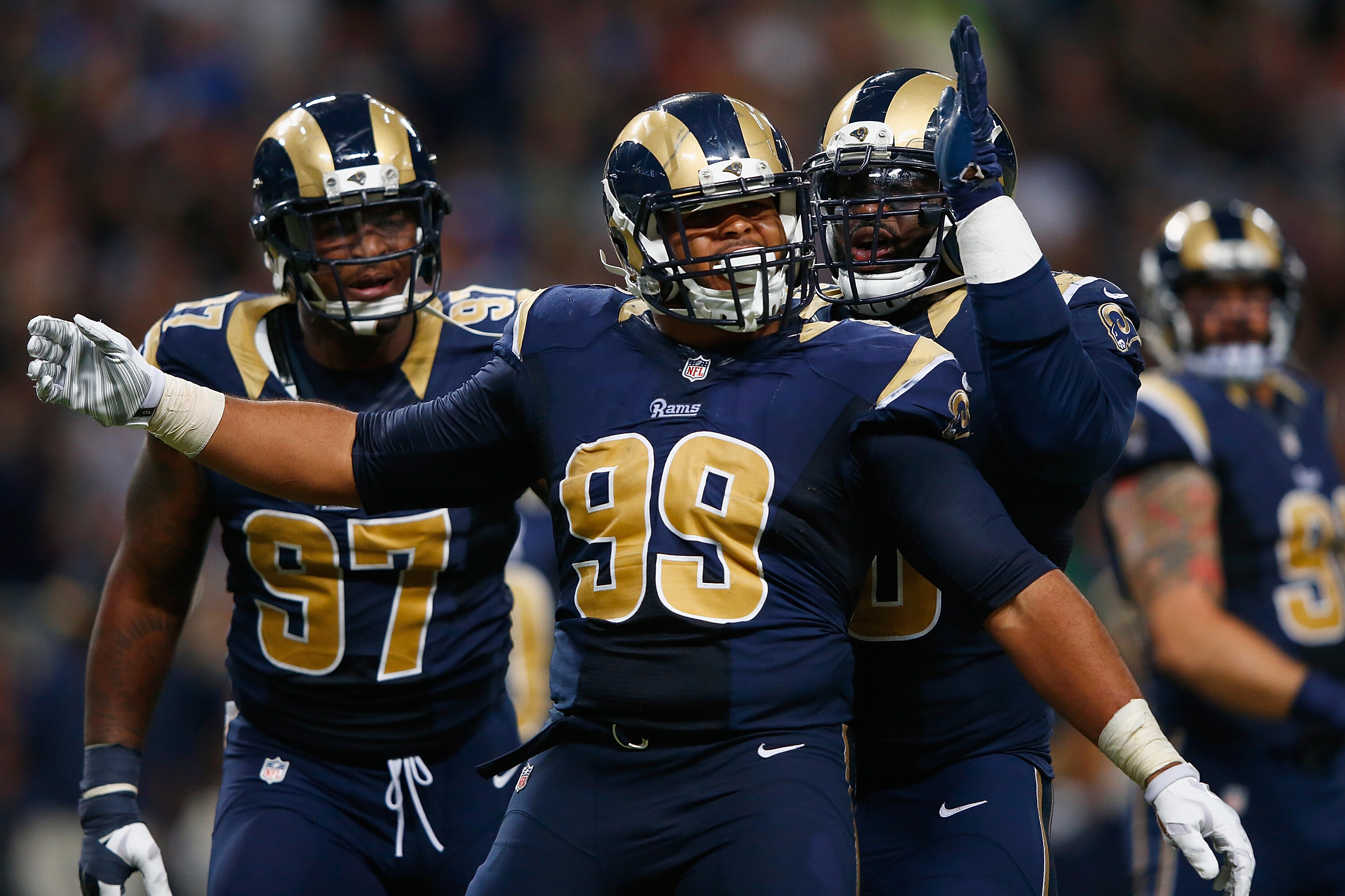 ST. LOUIS, MO - SEPTEMBER 13: Aaron Donald #99 of the St. Louis Rams celebrates a third quarter sack against the Seattle Seahawks at the Edward Jones Dome on September 13, 2015 in St. Louis, Missouri. (Photo by Jamie Squire/Getty Images)