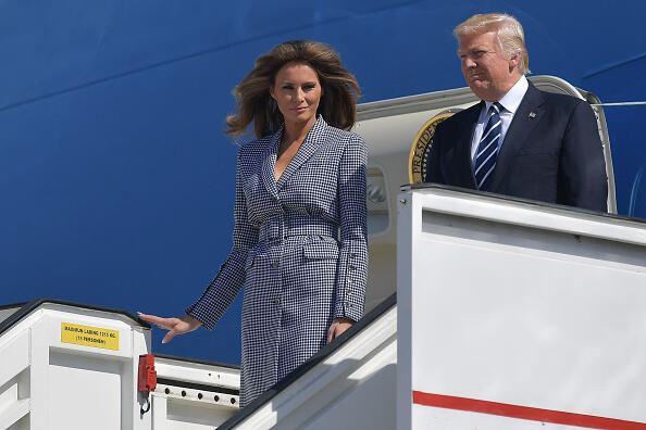 US President Donald Trump (R) and First Lady Melania Trump step off the Air Force One upon arrival at Brussels International Airport  on May 24, 2017. US President Donald Trump arrived in Brussels ahead of his first talks with NATO and European Union leaders.  / AFP PHOTO / MANDEL NGAN        (Photo credit should read MANDEL NGAN/AFP/Getty Images)