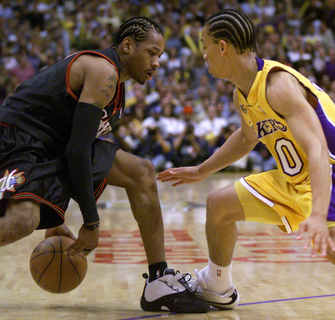 6 Jun 2001:  Tyronn Lue #10 of the Los Angeles Lakers guards Allen Iverson #3 of the Philadelphia 76ers during Game 1 of the NBA Finals at Staples Center in Los Angeles, California.  DIGITAL IMAGE Mandatory Credit: Jed Jacobsohn/ALLSPORT NOTE TO USER: It 