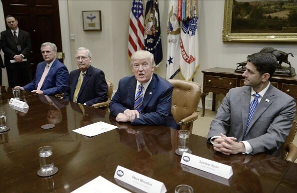 WASHINGTON, DC - JUNE 06: US President Donald Trump speaks as Senate Majority Leader Mitch McConnell (R-Ky.) (2-L) and House Speaker Paul Ryan( R) listen during a meeting with House and Senate leadership  in the Roosevelt Room of the White House, on June 6, 2017 in Washington, DC. (Photo by Olivier Douliery-Pool/Getty Images)