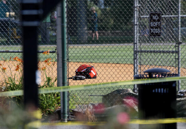 ALEXANDRIA, VA - JUNE 14:  Baseball equipment lays on the infielf at Eugene Simpson Field, the site where a gunman opened fire June 14, 2017 in Alexandria, Virginia. Multiple injuries were reported from the instance, the site where a congressional baseball team was holding an early morning practice, including House Republican Whip Steve Scalise (R-LA) who was reportedly shot in the hip.   (Photo by Win McNamee/Getty Images)