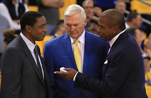 OAKLAND, CA - JUNE 01:  (L-R) Former NBA players Isiah Thomas and Jerry West speak with Ahmad Rashad prior to Game 1 of the 2017 NBA Finals between the Golden State Warriors and the Cleveland Cavaliers at ORACLE Arena on June 1, 2017 in Oakland, California. NOTE TO USER: User expressly acknowledges and agrees that, by downloading and or using this photograph, User is consenting to the terms and conditions of the Getty Images License Agreement.  (Photo by Ezra Shaw/Getty Images)
