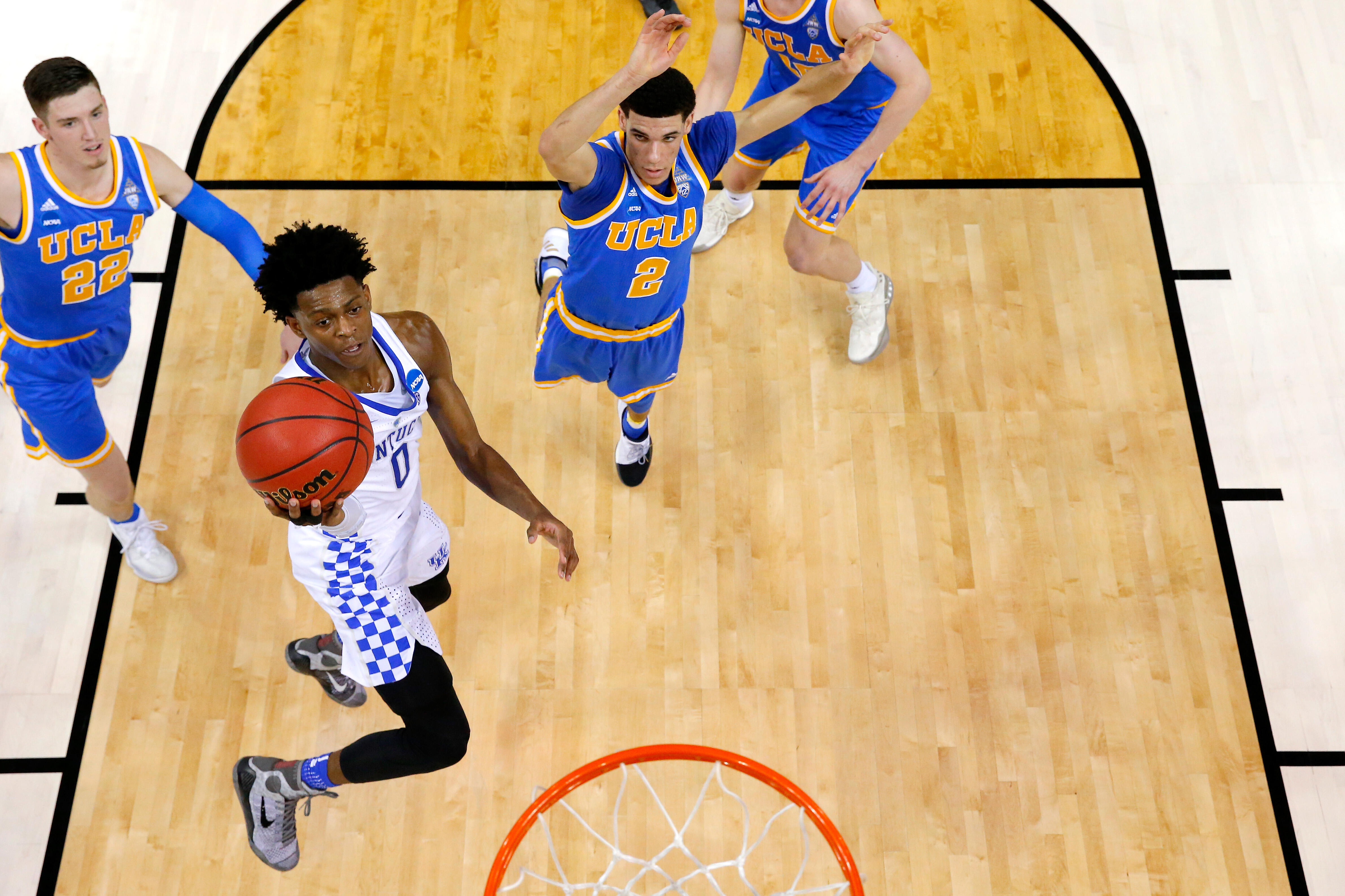 MEMPHIS, TN - MARCH 24: De'Aaron Fox #0 of the Kentucky Wildcats drives to the basket against Lonzo Ball #2 of the UCLA Bruins in the first half during the 2017 NCAA Men's Basketball Tournament South Regional at FedExForum on March 24, 2017 in Memphis, Te