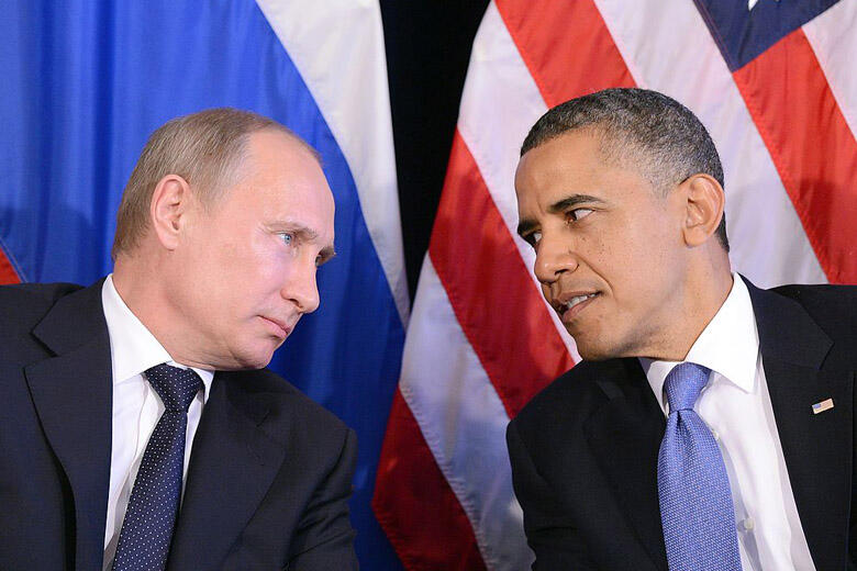 US President Barack Obama (R) listens to Russian President Vladimir Putin after their bilateral meeting in Los Cabos, Mexico on June 18, 2012 on the sidelines of the G20 summit. Obama and President Vladimir Putin met Monday, for the first time since the R