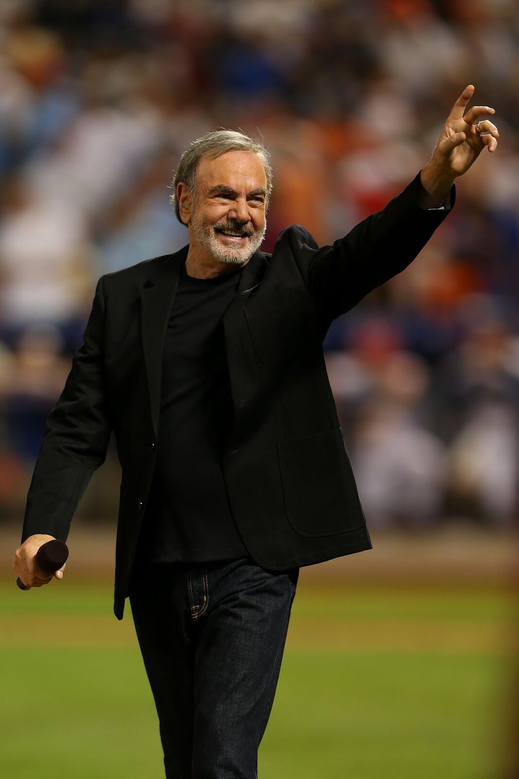 NEW YORK, NY - JULY 16:  Singer Neil Diamond performs during the 84th MLB All-Star Game on July 16, 2013 at Citi Field in the Flushing neighborhood of the Queens borough of New York City.  (Photo by Mike Ehrmann/Getty Images)