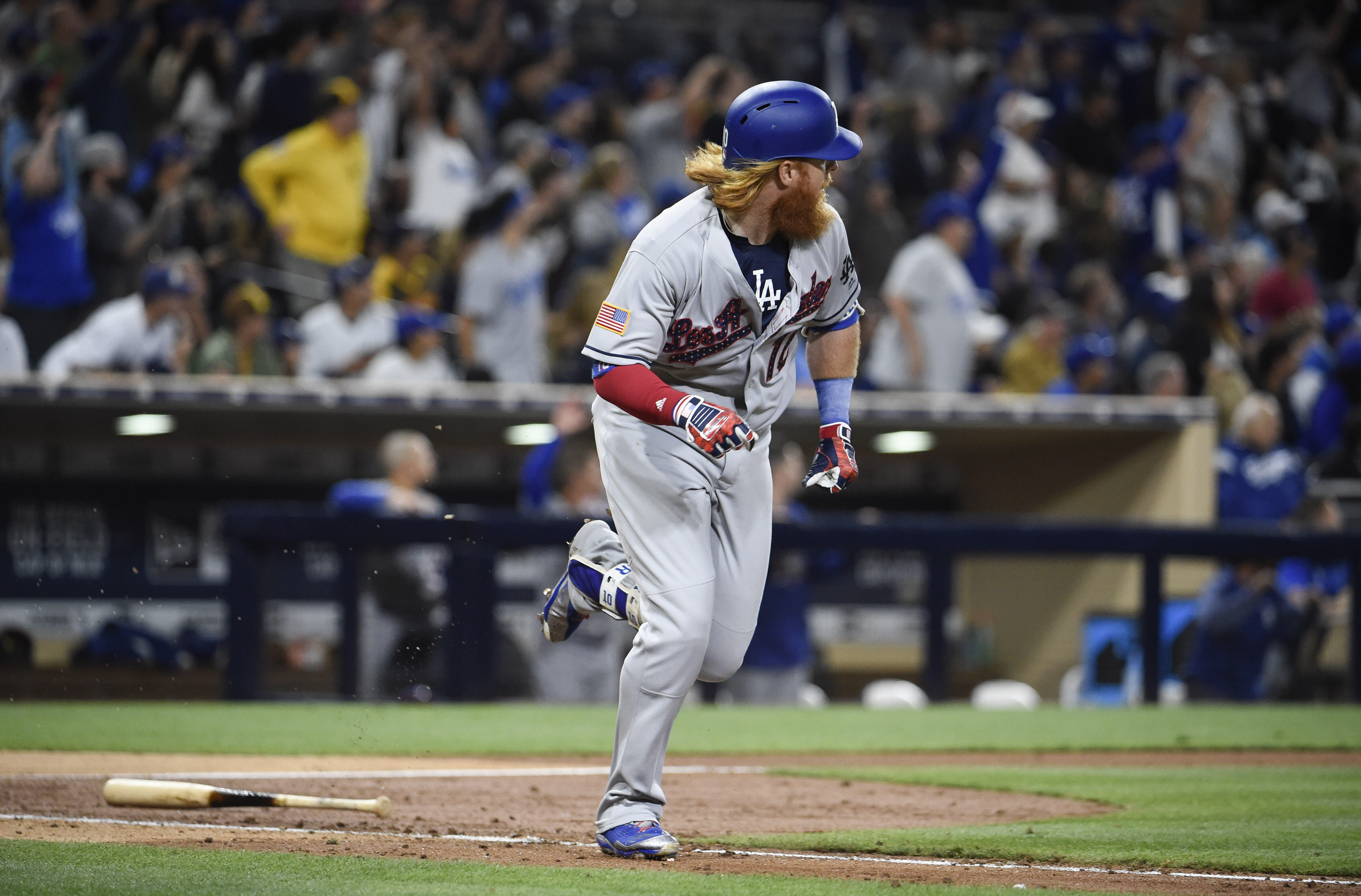 SAN DIEGO, CA - JULY 1: Justin Turner #10 of the Los Angeles Dodgers watches the flight of his  solo home run during the fifth inning of a baseball game against the San Diego Padres at PETCO Park on July 1, 2017 in San Diego, California. (Photo by Denis P