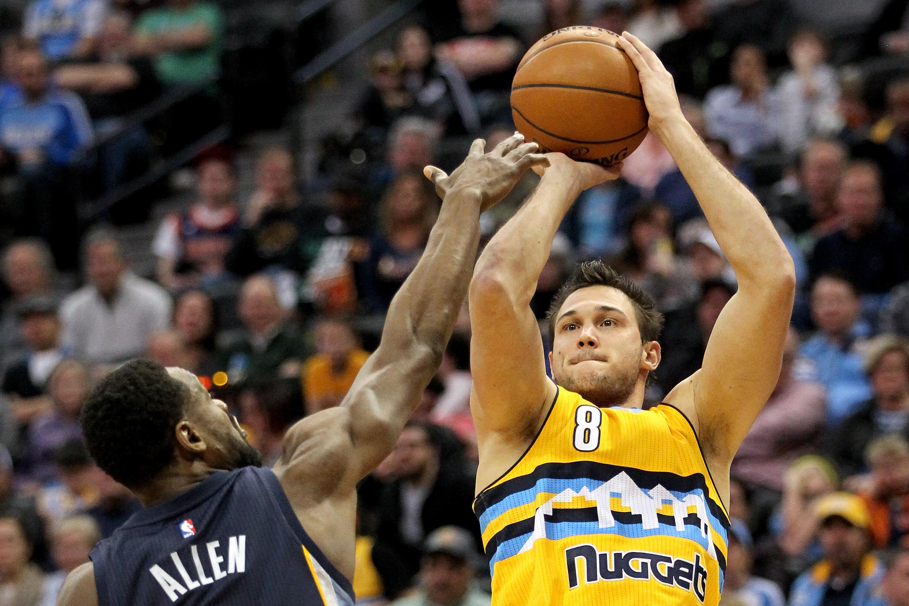 DENVER, CO - FEBRUARY 26:  Danilo Gallinari #8 of the Denver Nuggets puts up a shot over Tony Allen #9 of the Memphis Grizzlies at the Pepsi Center on February 26, 2017 in Denver, Colorado. NOTE TO USER: User expressly acknowledges and agrees that , by do