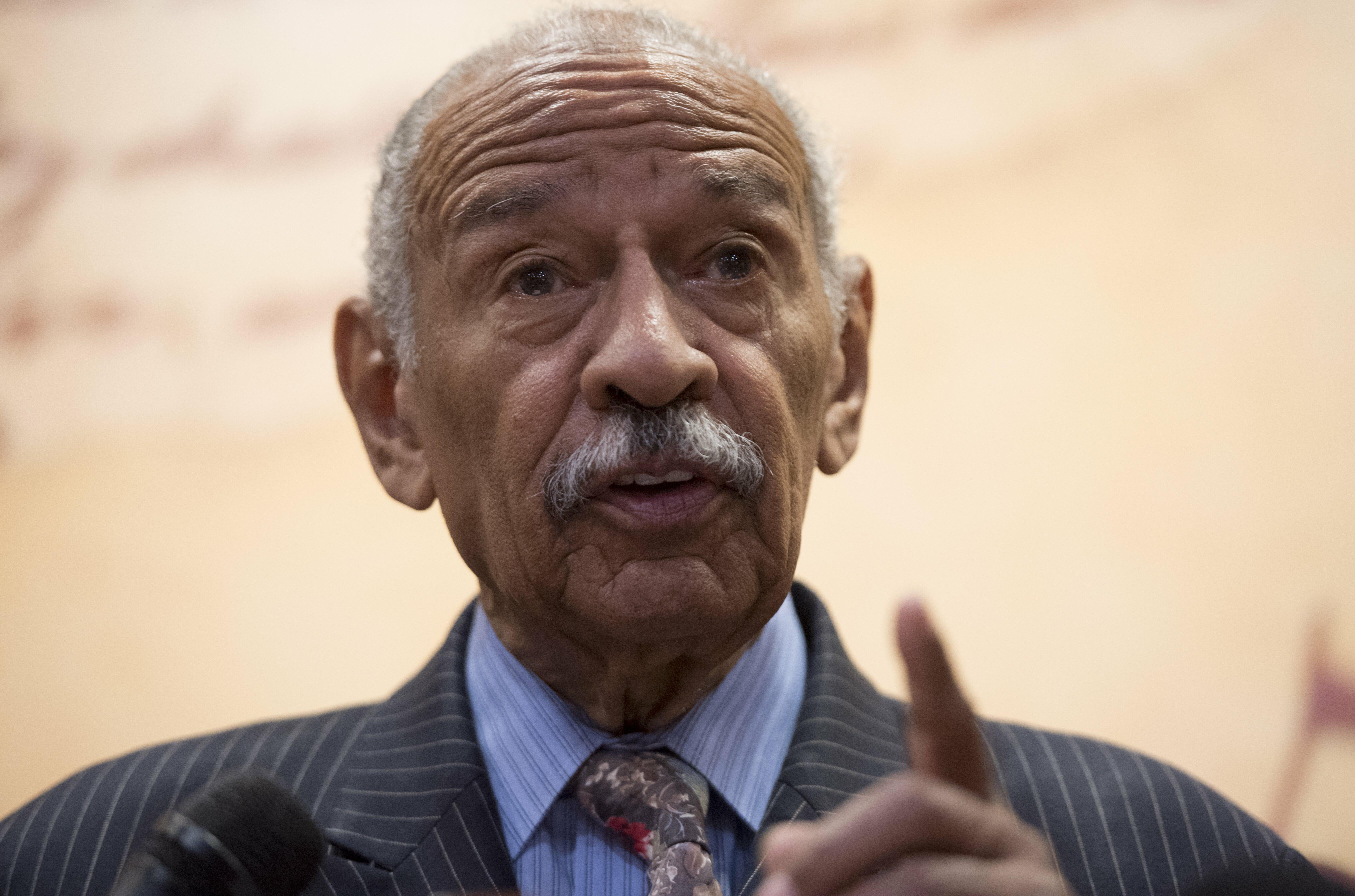US Representative John Conyers, Democrat of Michigan, speaks regarding a lawsuit members of Congress have filed against US President Donald Trump for violating the emoluments clause of the US Constitution which bans Presidents from accepting payments, benefits or gifts from foreign states without the consent of Congress, during a press conference on Capitol Hill in Washington, DC, June 20, 2017. / AFP PHOTO / SAUL LOEB (Photo credit should read SAUL LOEB/AFP/Getty Images)