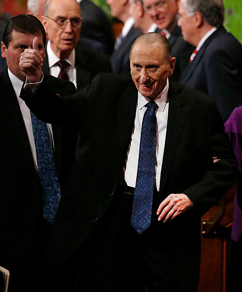 SALT LAKE CITY, UT - APRIL 2: President Thomas Monson, gives a thumbs up as he leaves the morning session of the 186th Annual General Conference of the Church of Jesus Christ of Latter-Day Saints on April 2, 2016 in Salt Lake City, Utah. Mormons from around the world will gather in Salt Lake City to hear direction from church leaders at the two day conference. (Photo by George Frey/Getty Images)