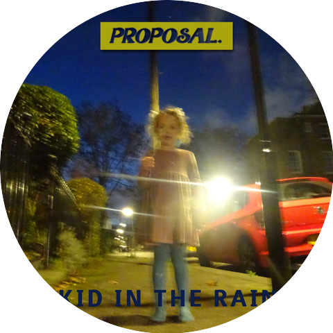 Kid In The Rain