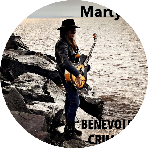 Marty E.