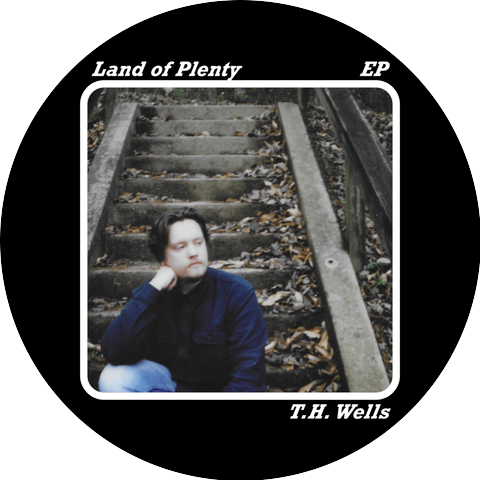 T.H. Wells