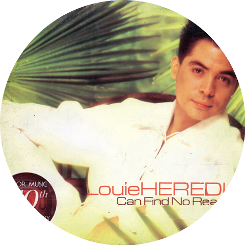 LOUIE HEREDIA