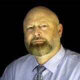 Photo of Big Angry Law Charles Adams