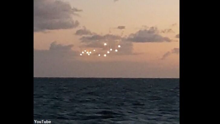 Watch: Fleet of UFOs Caught on Film?