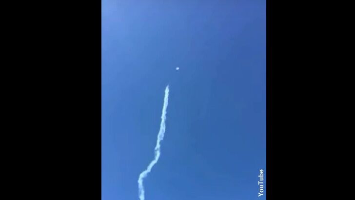 Video: UFO Buzzes Jet at Air Show?