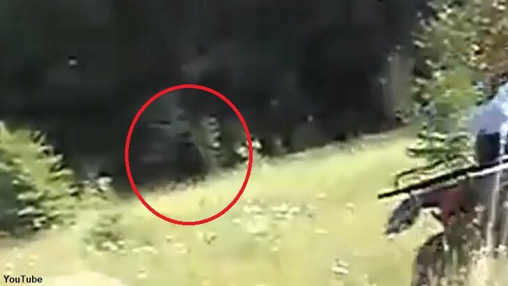 Bigfoot Photobombs Man on ATV?