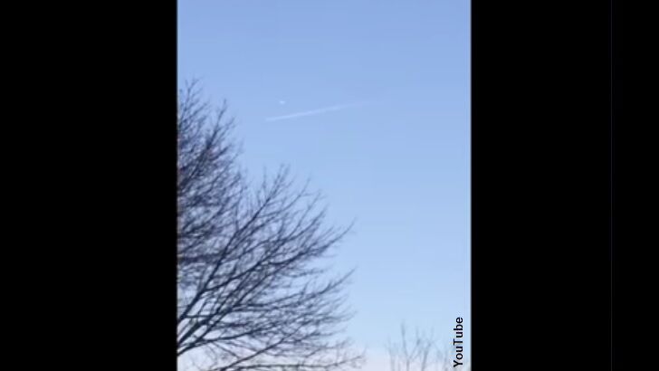 Odd Orb Filmed Following Jet in NH