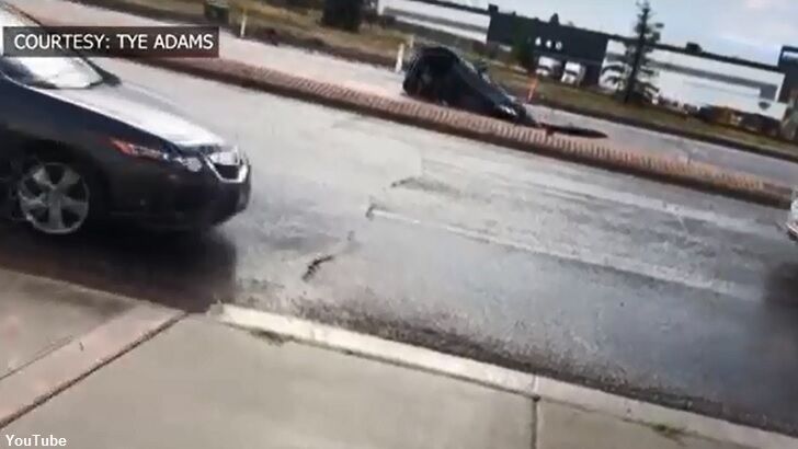 Watch: Sinkhole Swallows SUV