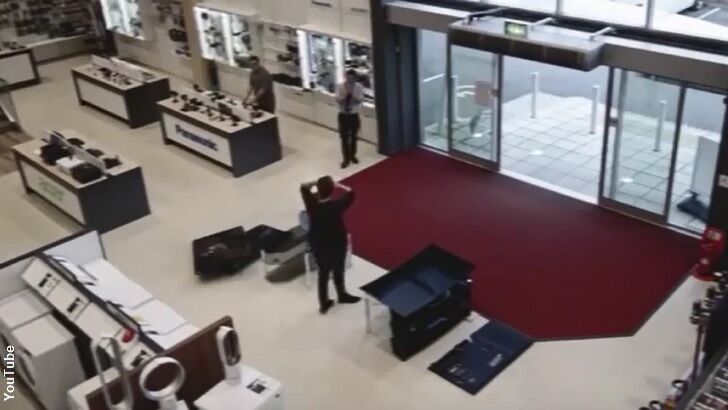 Video: Clumsy Customer Topples Four TVs