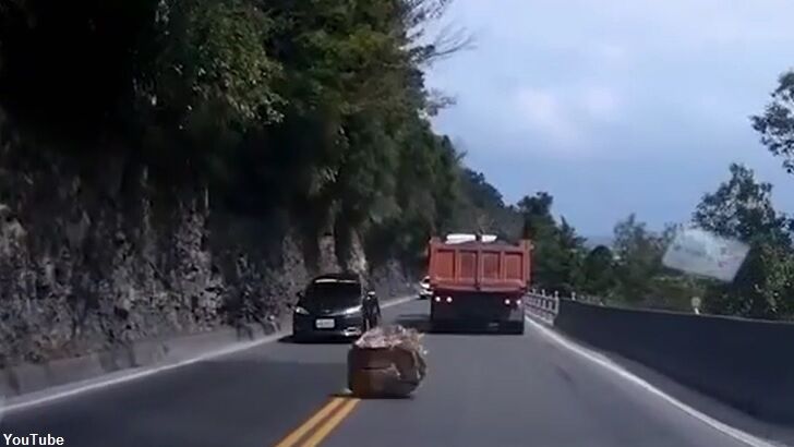 Watch: Giant Falling Boulder Barely Misses Car in Taiwan