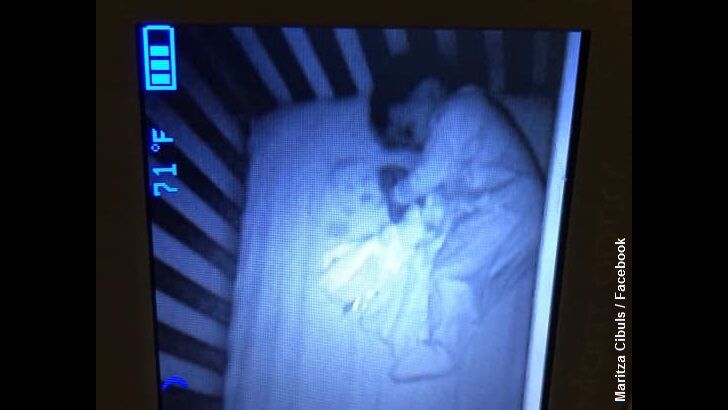 Mom Spots Spooky 'Ghost Baby' on Monitor Next to Sleeping Son