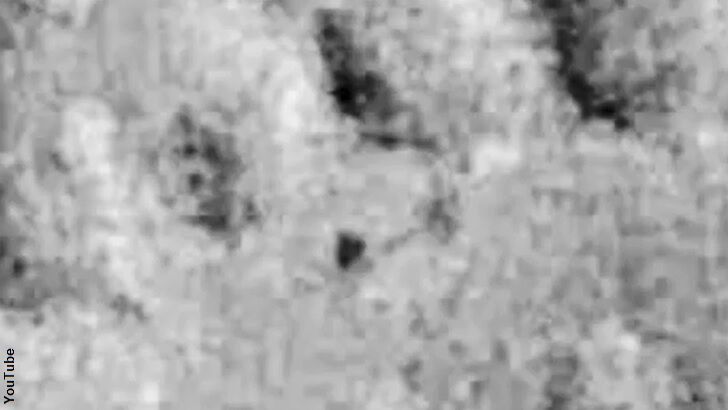 Watch: Triangular UFO Filmed Over the Moon?
