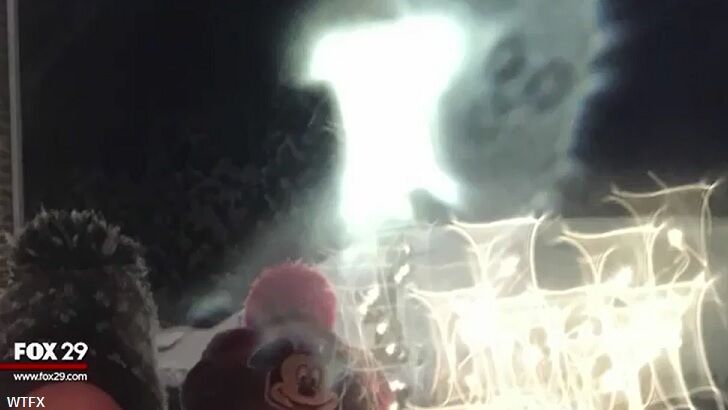 Video: 'Friendly Ghost' Appears in Family's Holiday Photo