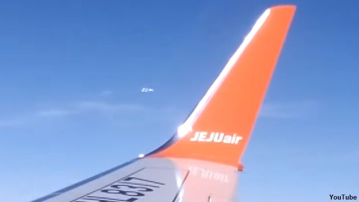 Watch: UFO Cluster Filmed from Airliner?