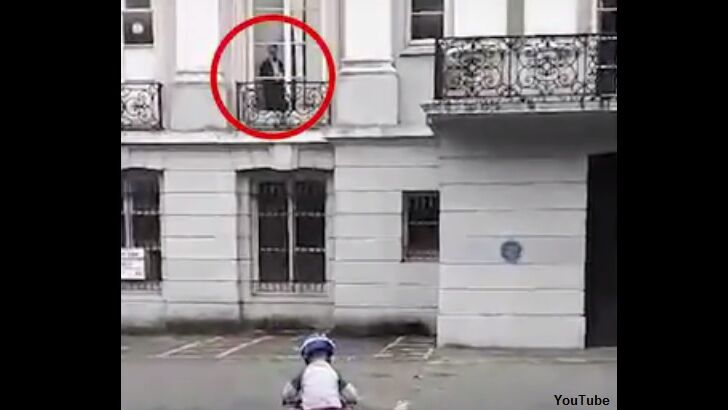 Video: Ghost Watches Boy on Bike?