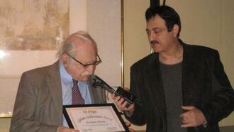 George Presents Zecharia Sitchin with Award