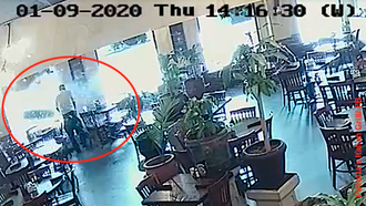 Runaway Tire Narrowly Misses Restaurant Employee