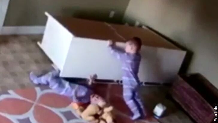 Watch: Boy Rescues Trapped Twin