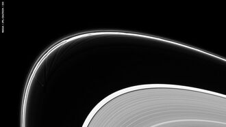 Saturn's Moon Crashes Rings