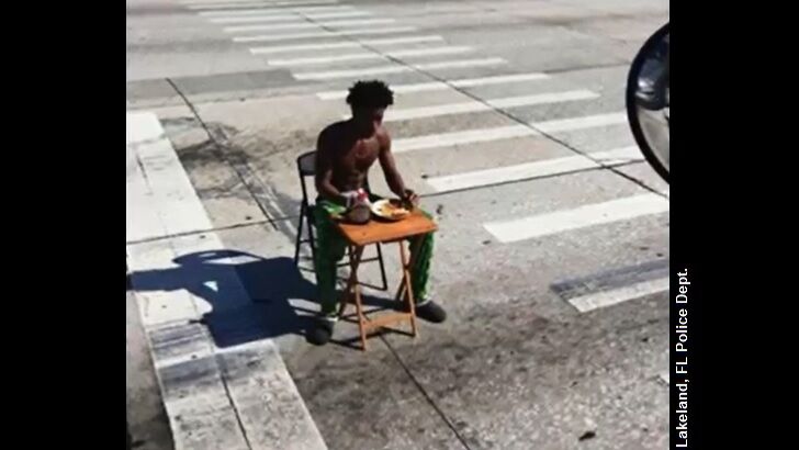 Man Arrested for Eating Breakfast in Road