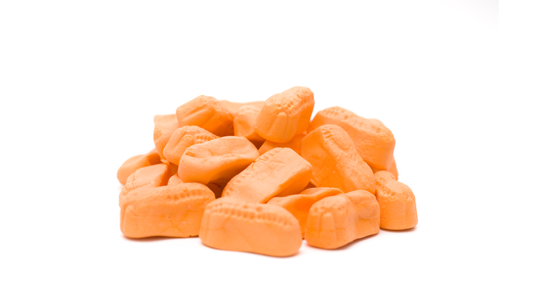 Orange Candy Peanuts on a White Background