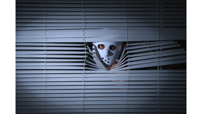 Spooky men behind blinds