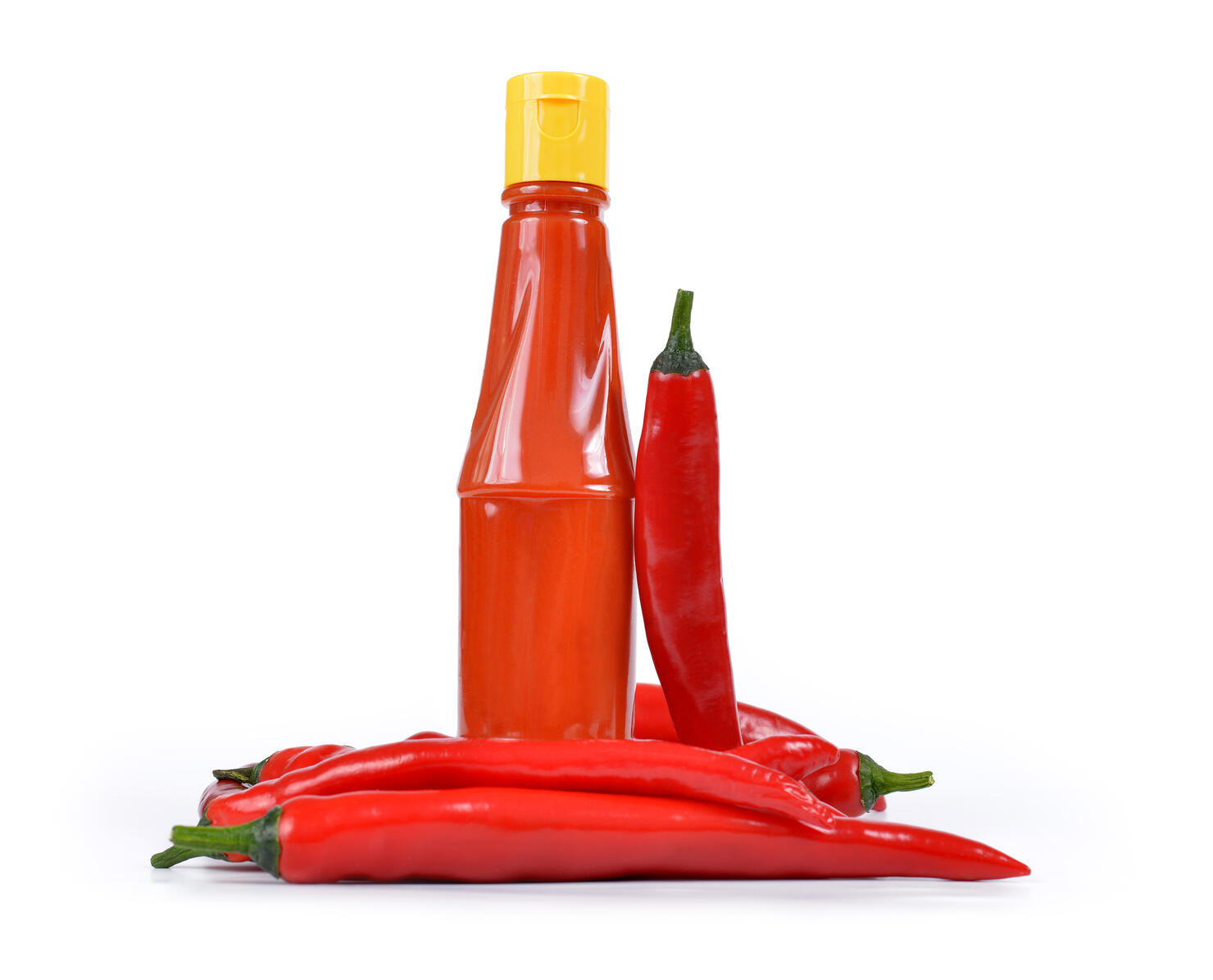 Hot sauce in bottle with Red chili pepper