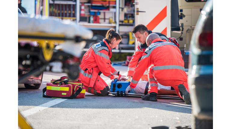 Paramedics providing first aid