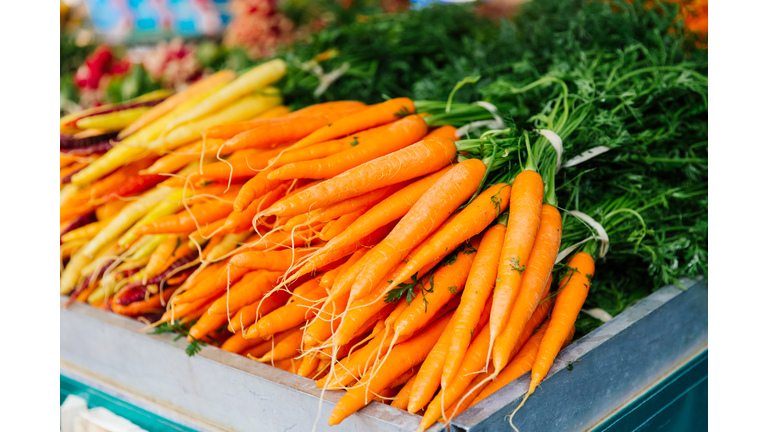 Fresh carrot on the market stall at the farmer's market