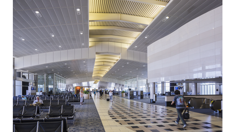 Passengers and travellers in the terminal at Tampa International Airport, Tampa, Florida, USA