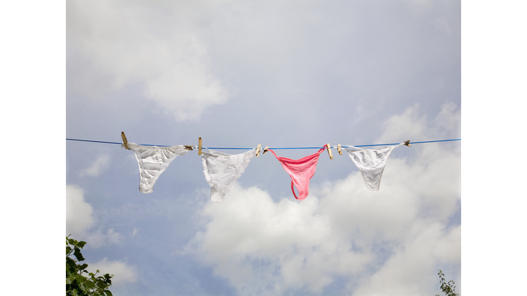 Women's underwear hanging on washing line