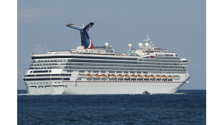 Carnival Valor Cruise ship with Pilot Boat