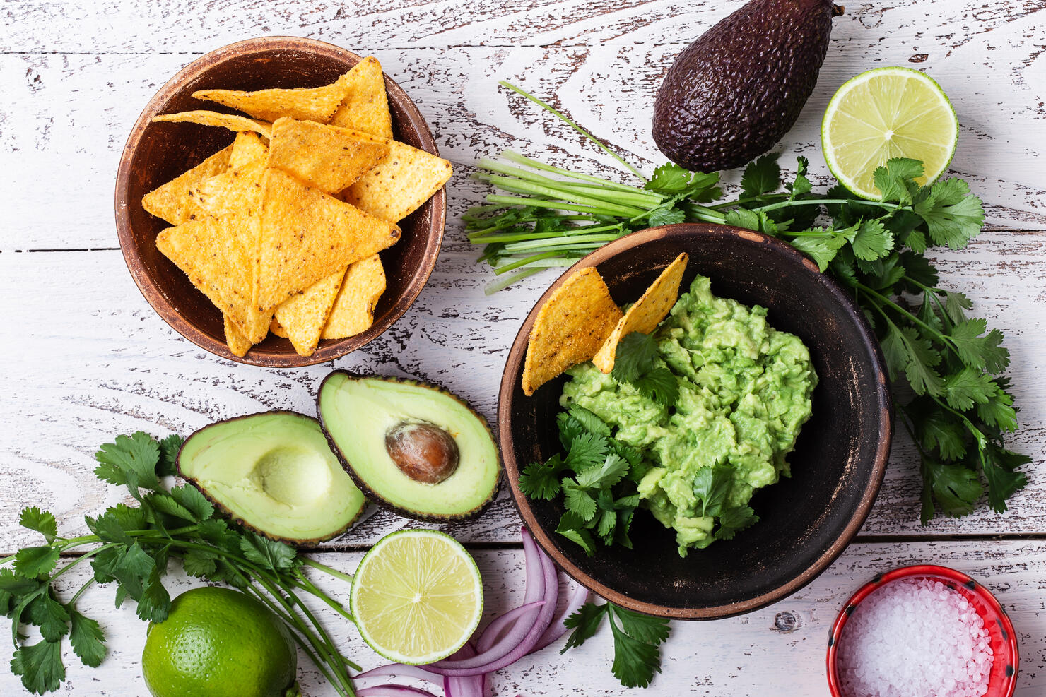 Making guacamole sauce, Mexican cuisine ingredients