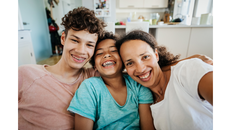 Portrait Of Single Mom Having Fun With Two Sons