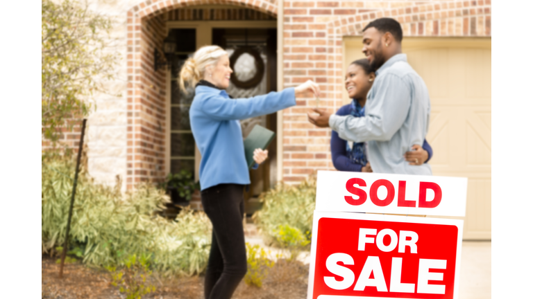 Real Estate: African descent couple buys home. Realtor gives key.