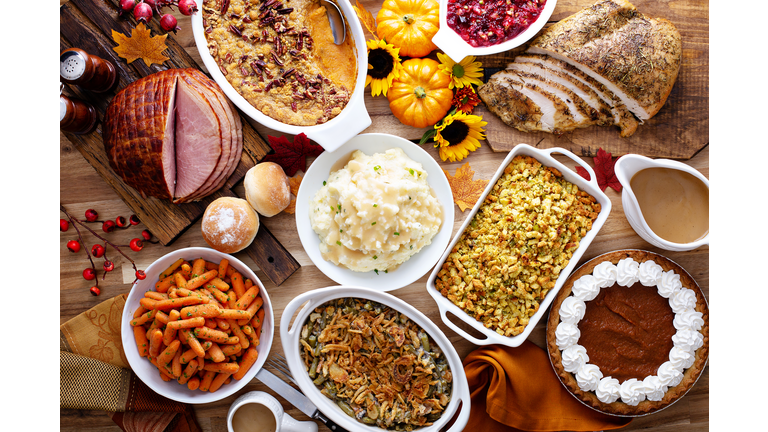 Thanksgiving table with turkey and sides